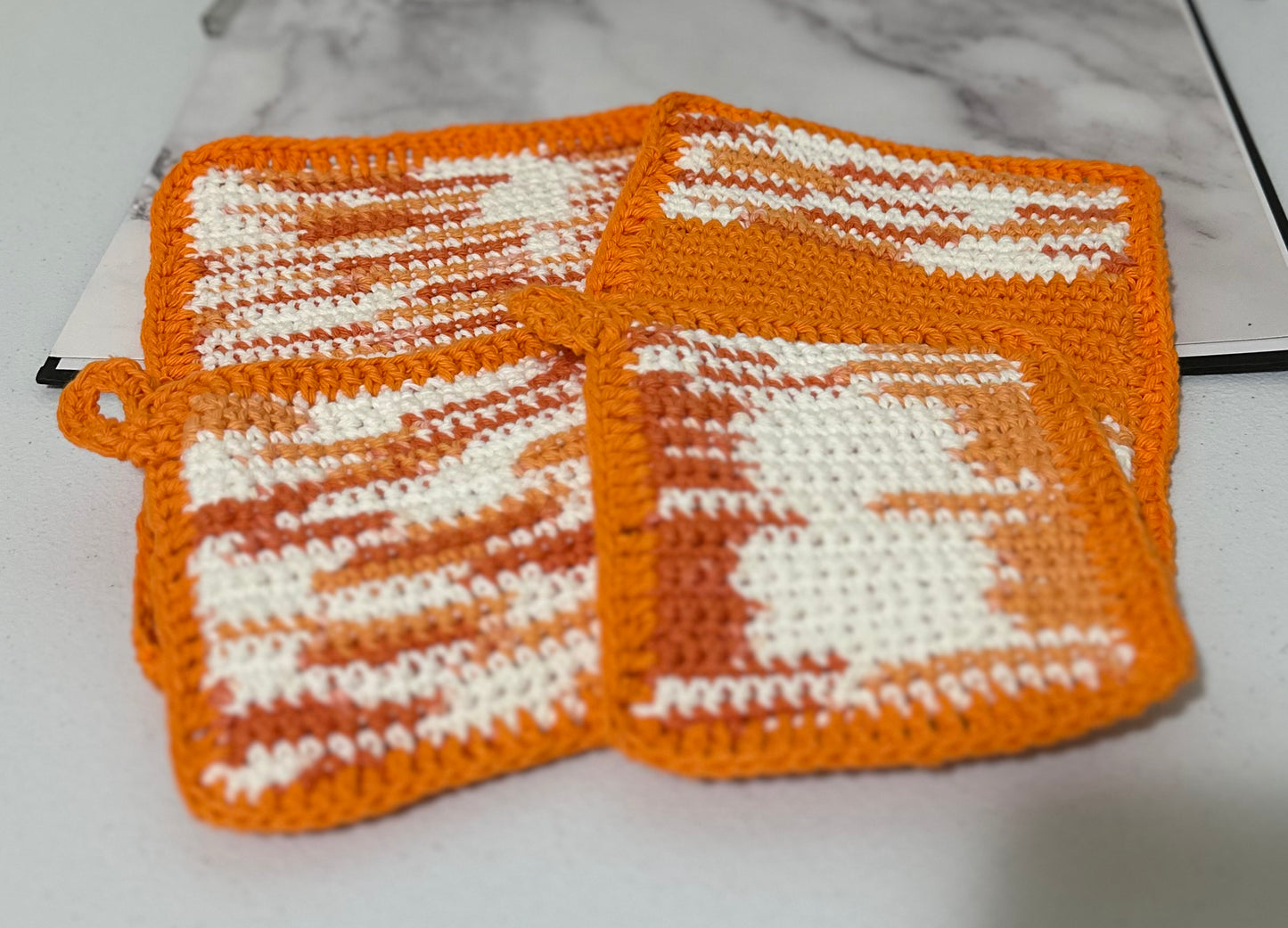 Pot holders and hot pads -